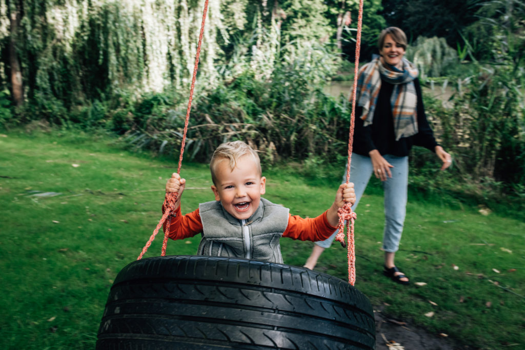 toddler playing on the hammock